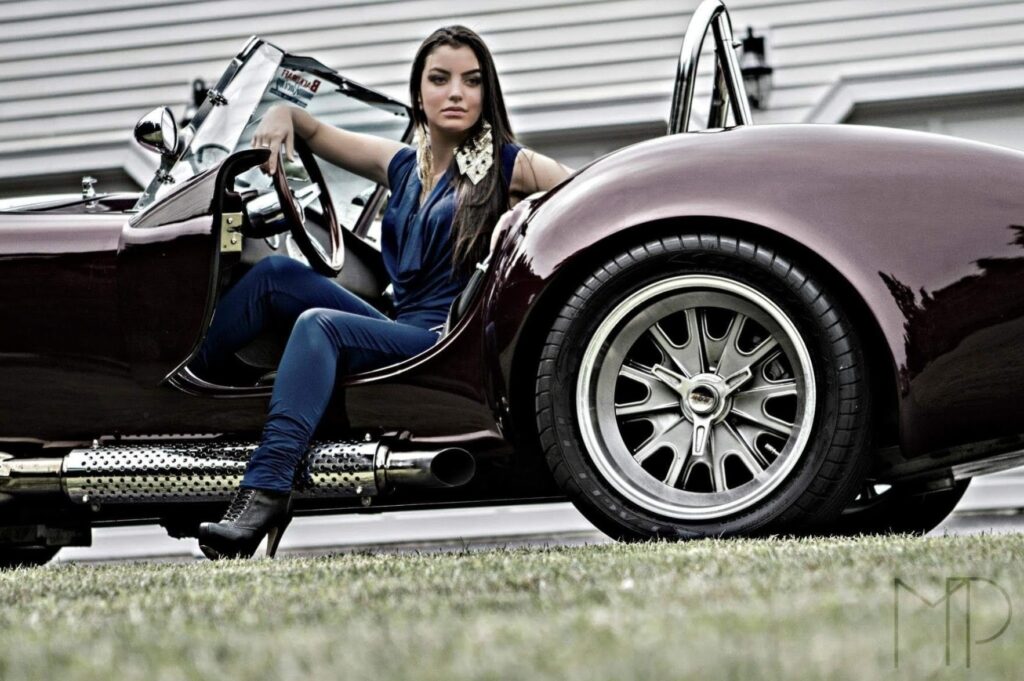 Beautiful Women Sitting in Vintage Car